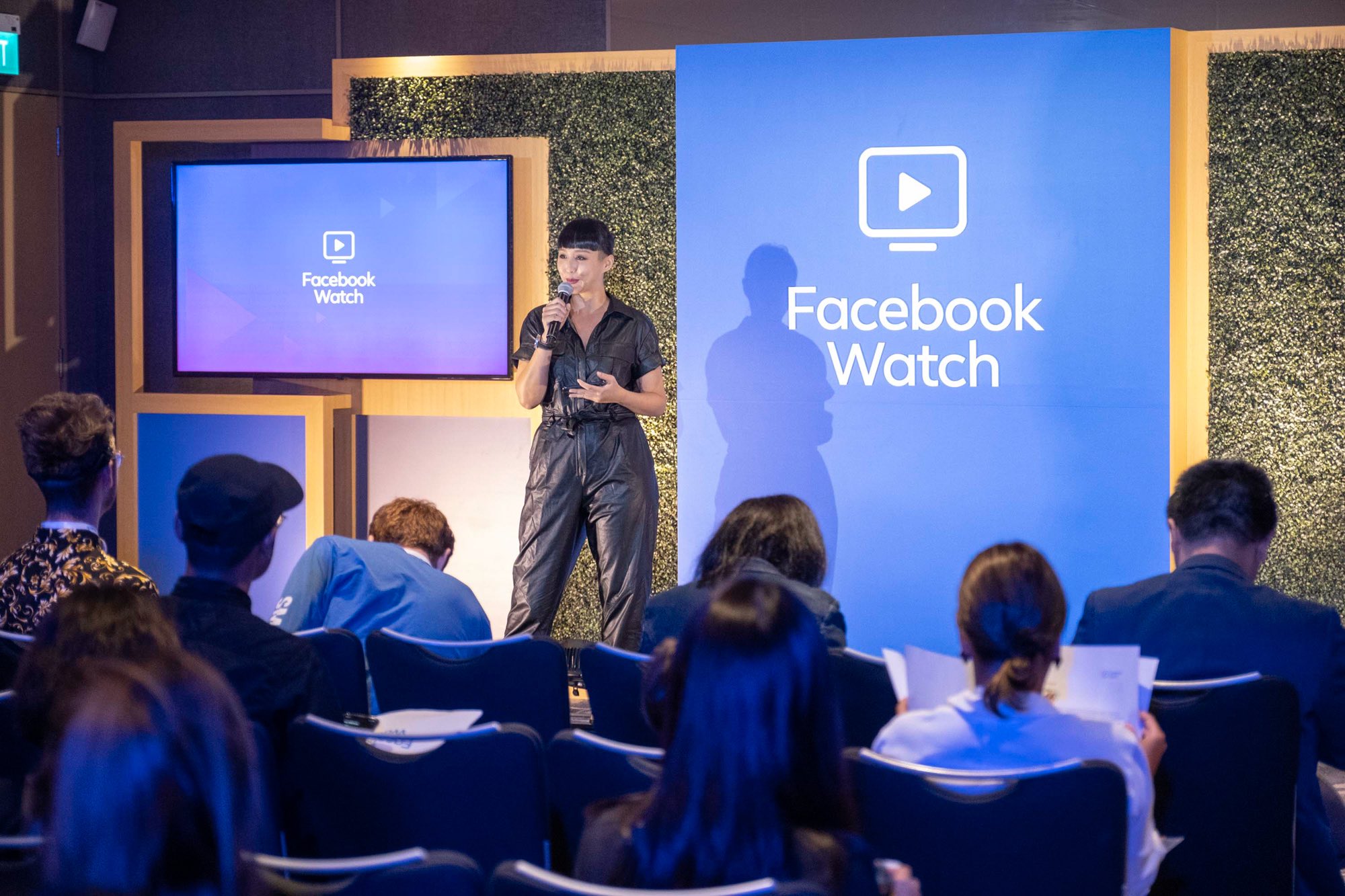 Annual report photograph of female speaker at a Facebook Watch event shot by Coco Creative Studio Singapore