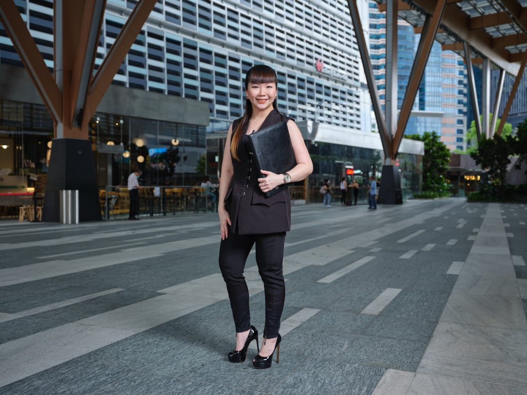 professional businesswoman in an outdoor corporate headshot session in the cbd