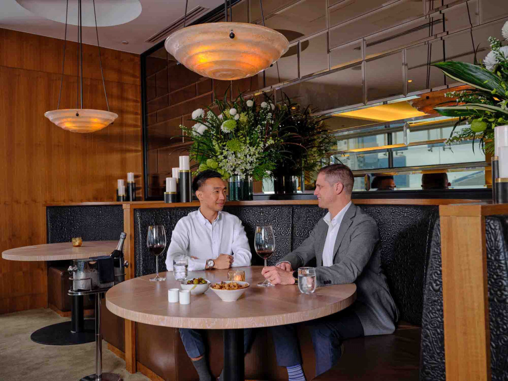 Artemis Interior Photo with 2 men at the booths