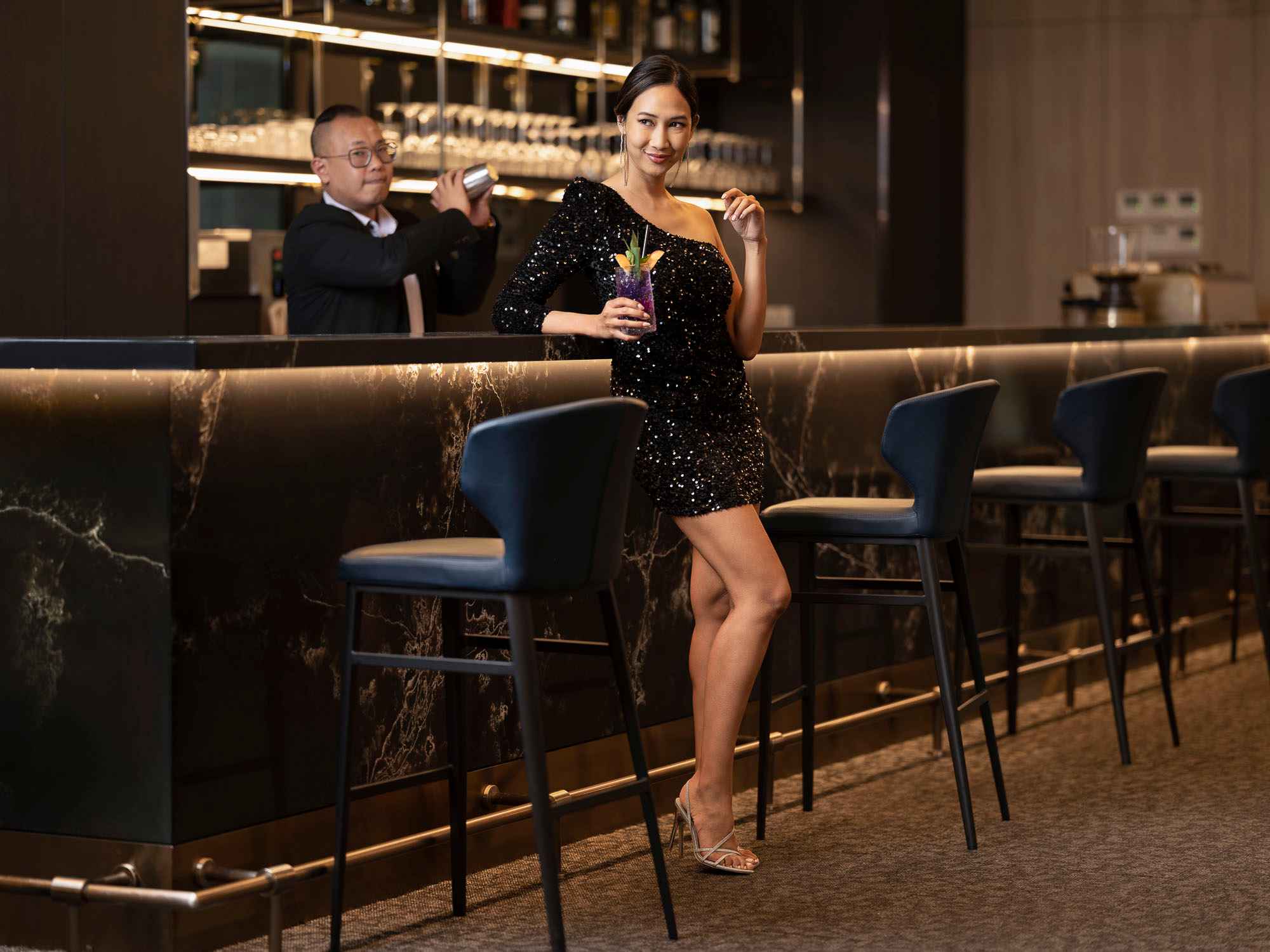 Lady enjoying a cocktail at Orchid Hotel, photo taken by coco creative studio lifestyle shoot-Orchid-lifestyle-interior-hospitality-photgraphy-coco-creative-studio-singapore-france