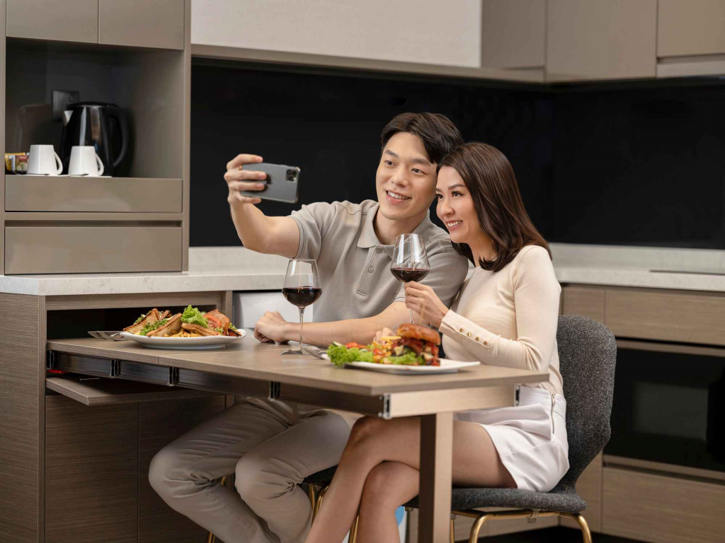 Couple taking a selfie at orchid hotel, photo taken by coco creative studio lifestyle shoot-Orchid-lifestyle-interior-hospitality-photgraphy-coco-creative-studio-singapore-france