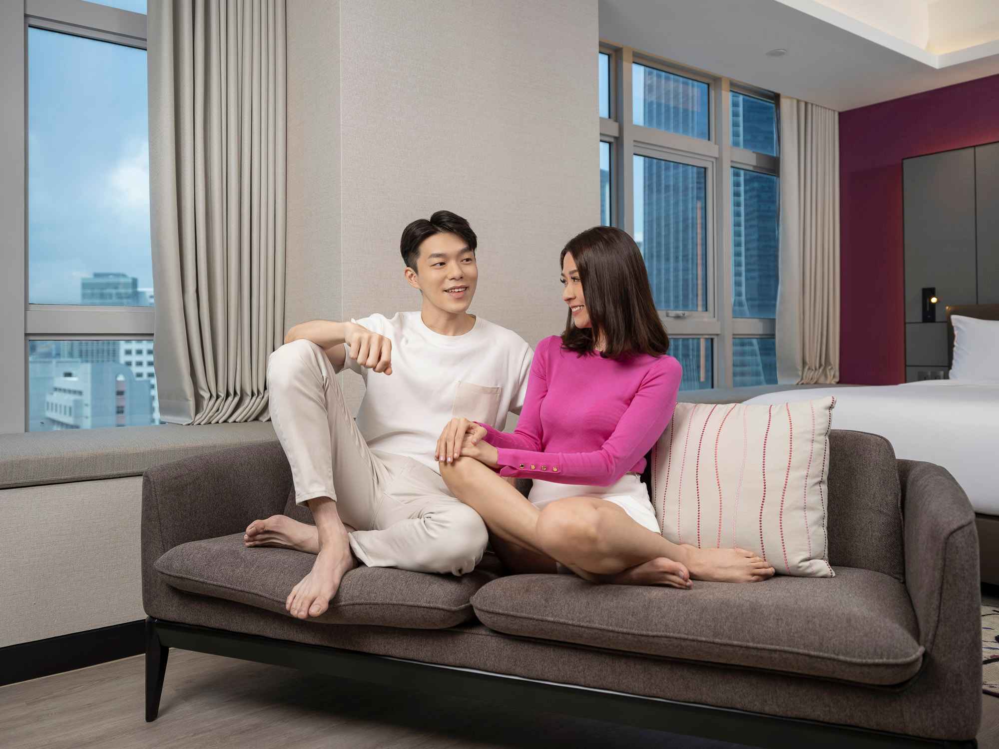 Couple talking on the couch at orchid hotel, photo taken by coco creative studio lifestyle shoot-Orchid-lifestyle-interior-hospitality-photgraphy-coco-creative-studio-singapore-france