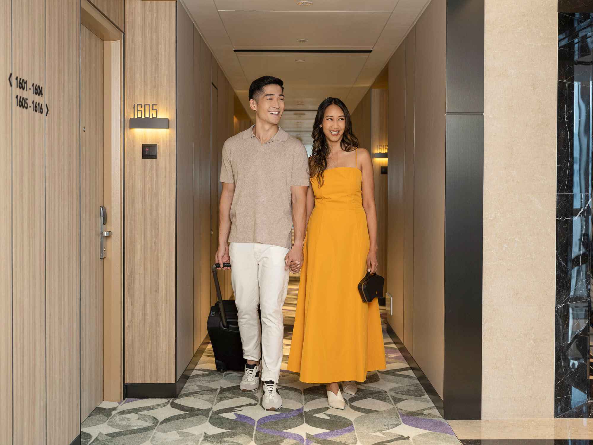 Couple checking in at orchid hotel, photo taken by coco creative studio lifestyle shoot
