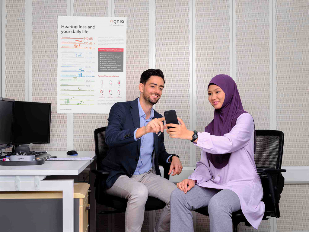 Doctor consulting patient on phone, photo taken by coco creative studio commercial photography