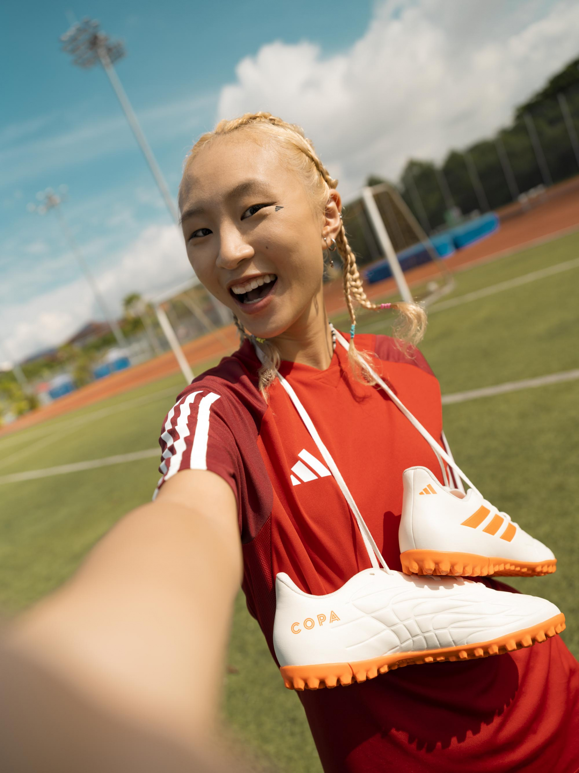 selfy portrait football feminine red goal shoes Adidas Asia Singapore adiclub membership fashion photographer commercial studio sport photography