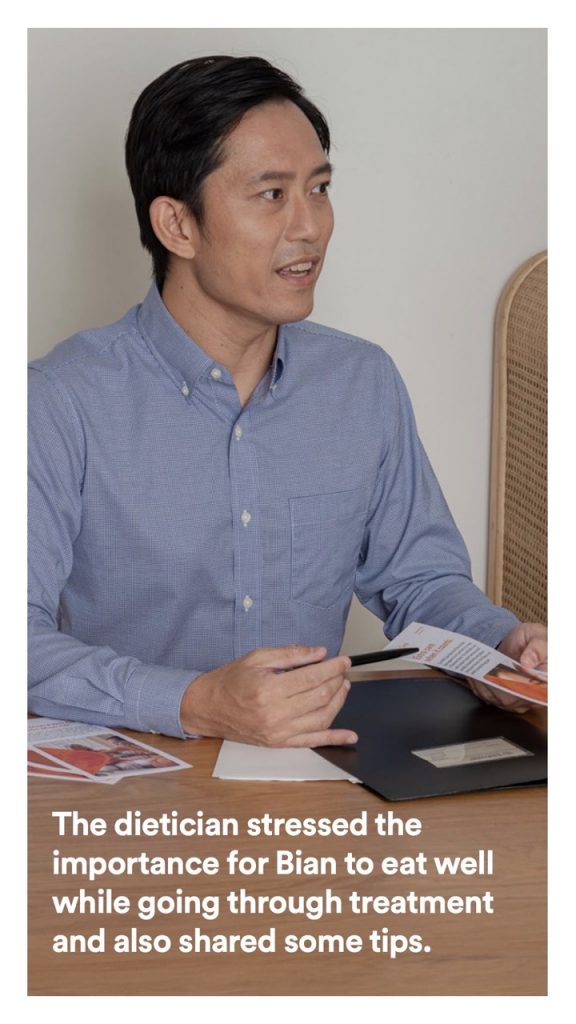 A dietician explains the importance of eating vegetables and other products to his patient