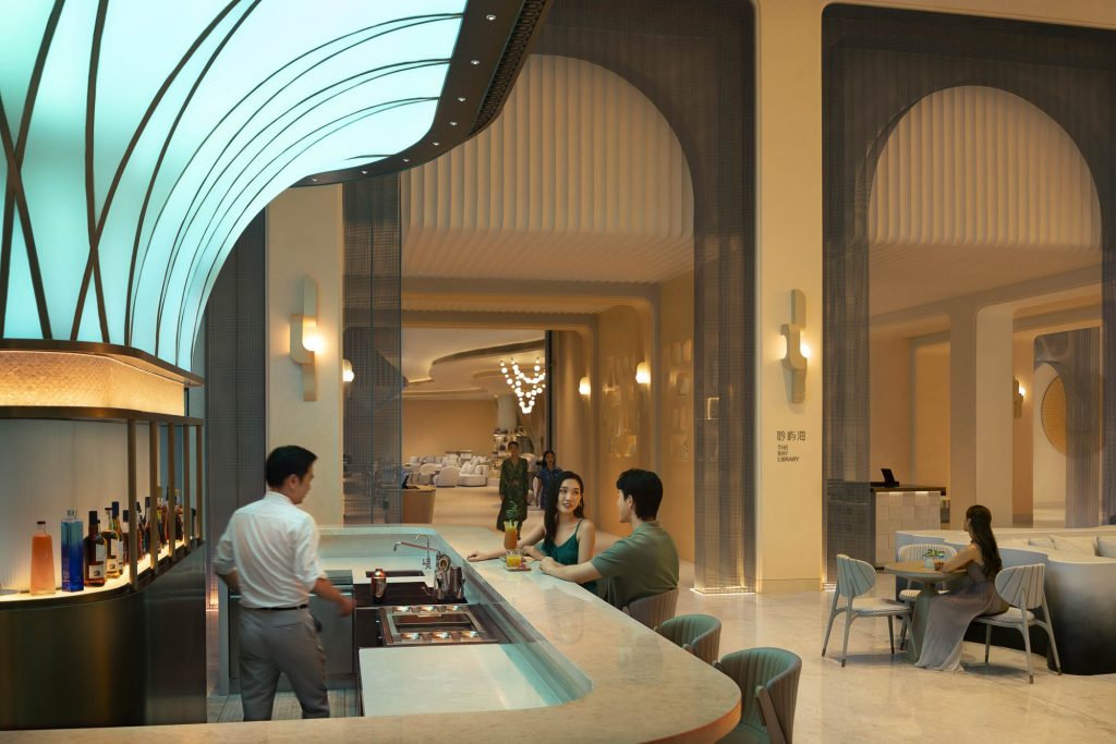 Hotel resort lifestyle photographer Hilton China Asia commercial - Couple having a drink in the bar of the hotel
