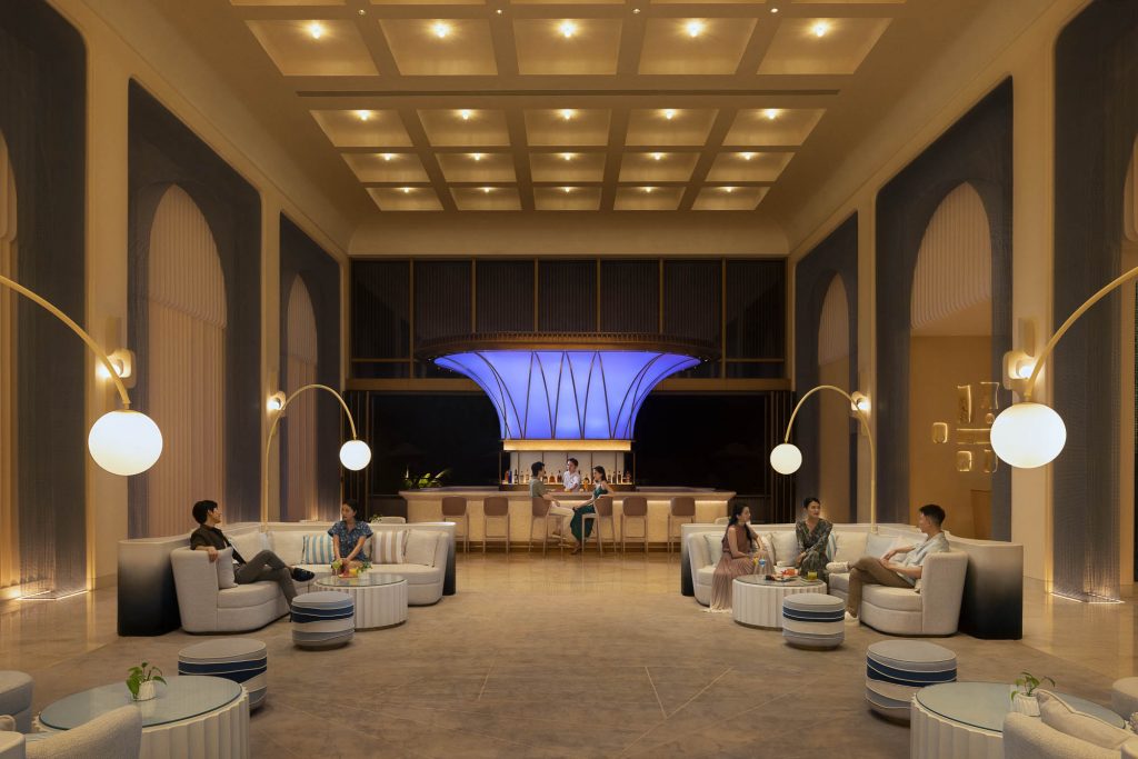 Hotel resort lifestyle photographer Hilton China Asia commercial - Hotel bar with nice lights and a blue bar