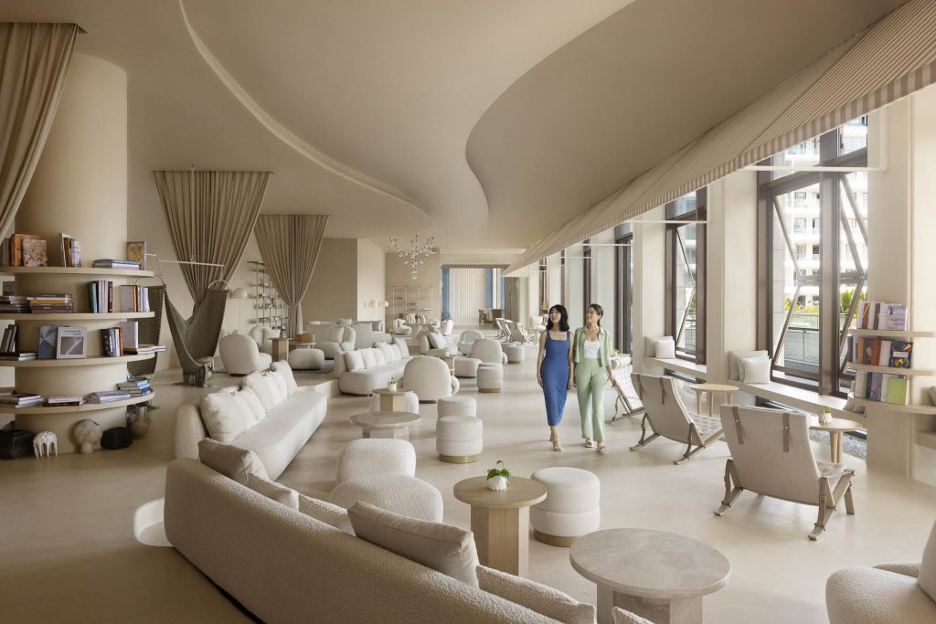 Hotel resort lifestyle photographer Hilton China Asia commercial - Hotel library. Two friends are walking around many books and a nice white room